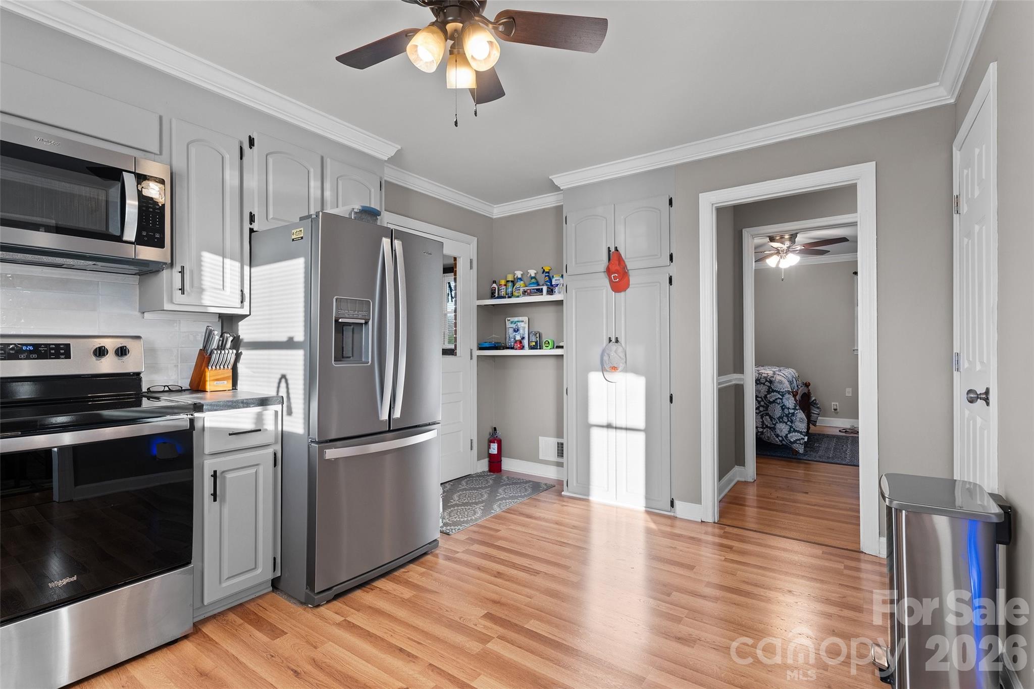 871 Saluda Road Chester, SC 29706 - Photo 15 of 46 a kitchen with stainless steel appliances granite countertop a refrigerator and a stove top oven