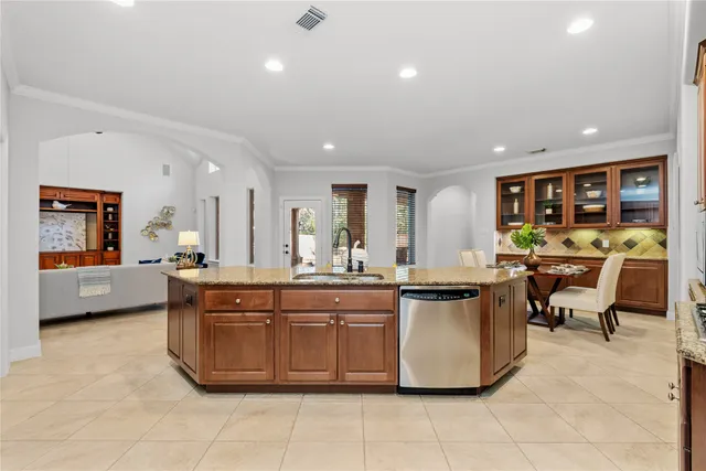a bathroom with a sink a mirror and a shower