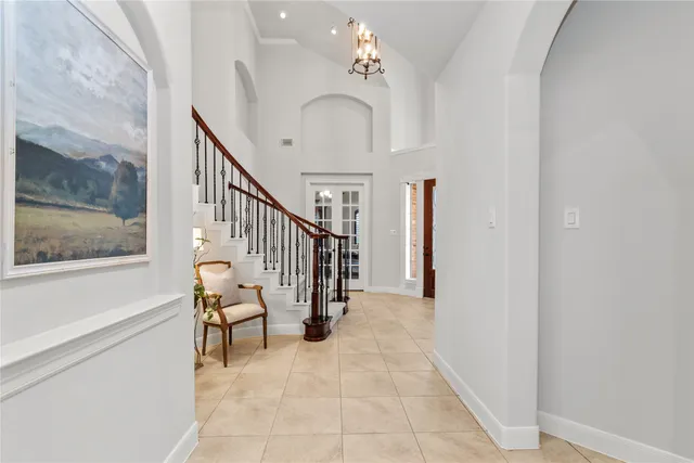 a bathroom with a mirror and a shower