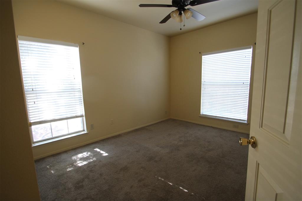 2524 Preston Road, Unit 1203 Plano, TX 75093 - Photo 13 of 30 an empty room with a window
