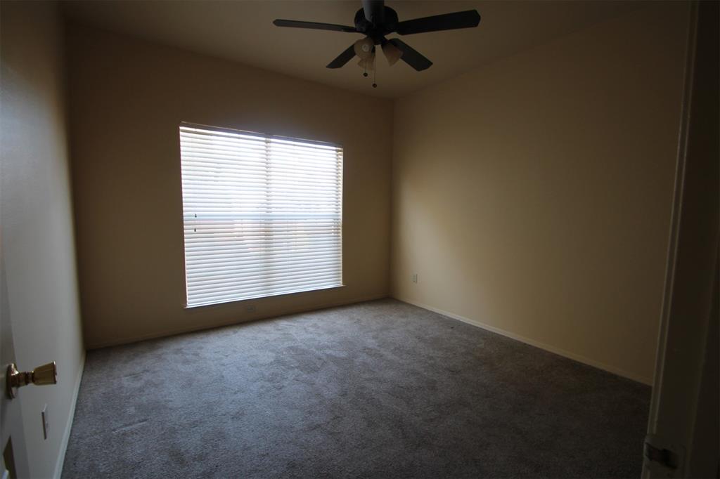 2524 Preston Road, Unit 1203 Plano, TX 75093 - Photo 17 of 30 an empty room with a window