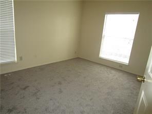2524 Preston Road, Unit 1203 Plano, TX 75093 - Photo 24 of 30 an empty room with a window