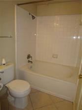 2524 Preston Road, Unit 1203 Plano, TX 75093 - Photo 30 of 30 a bathroom with a toilet and a shower