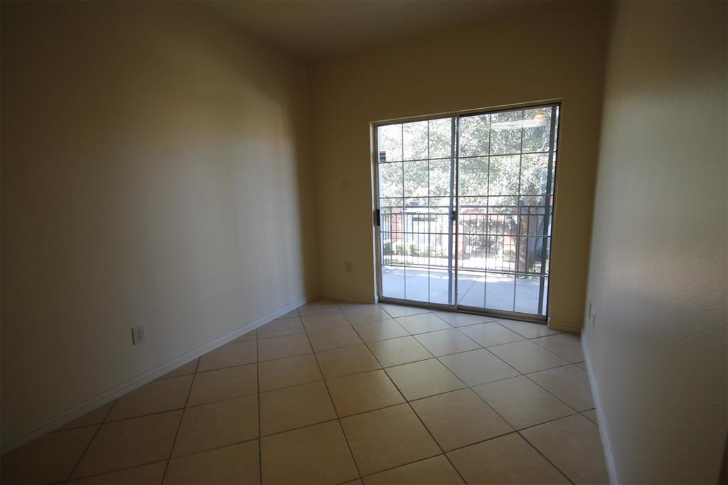 2524 Preston Road, Unit 1203 Plano, TX 75093 - Photo 8 of 30 a view of an empty room with a window