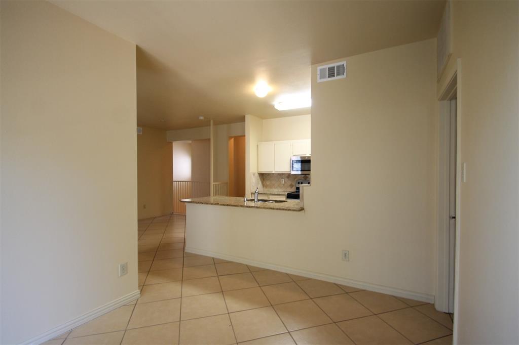 2524 Preston Road, Unit 1203 Plano, TX 75093 - Photo 9 of 30 a bathroom with a sink and a mirror