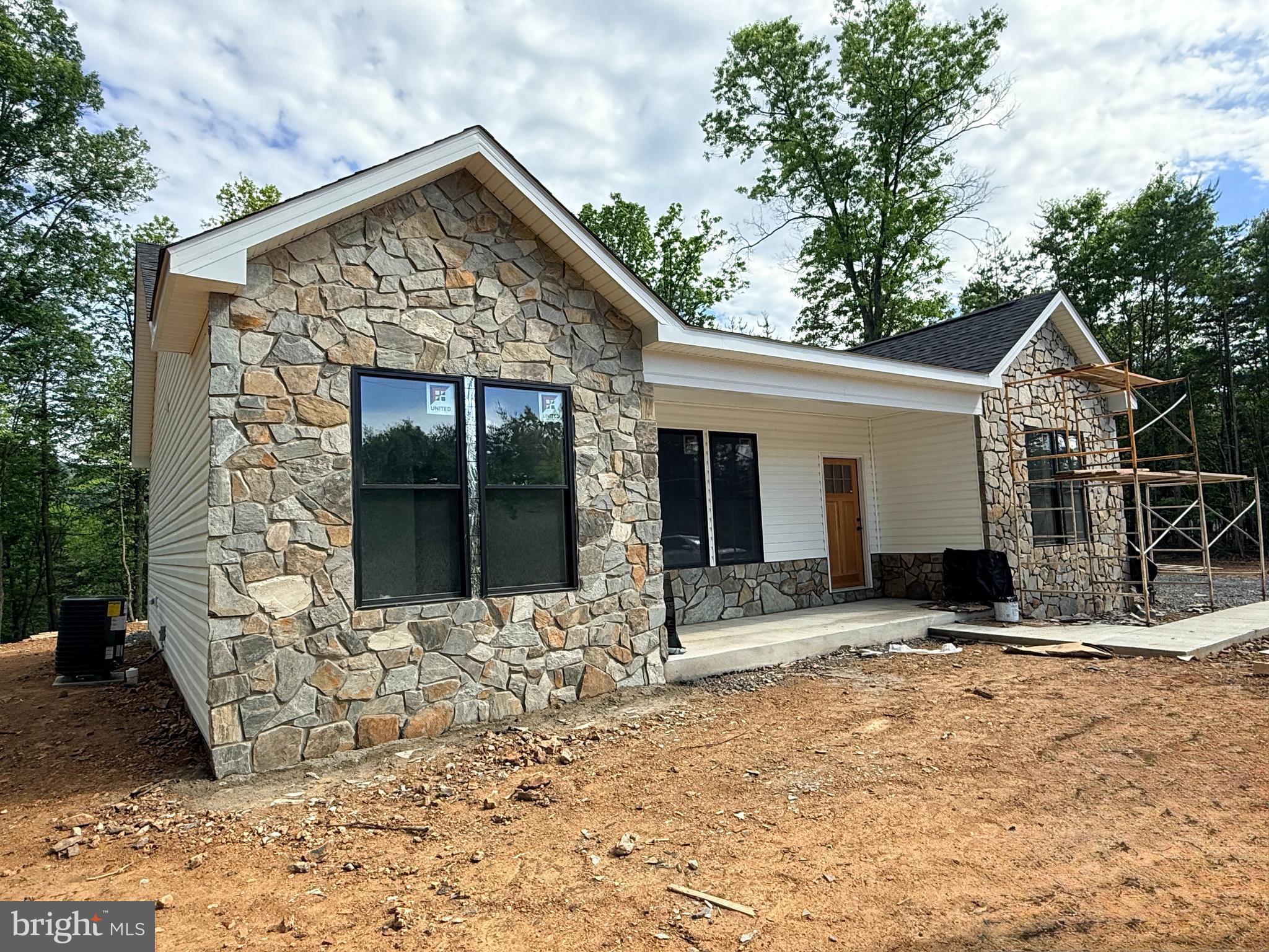 4 Jenkins Road Gerrardstown, WV 25420 - Photo 4 of 31 Stone exterior almost complete!