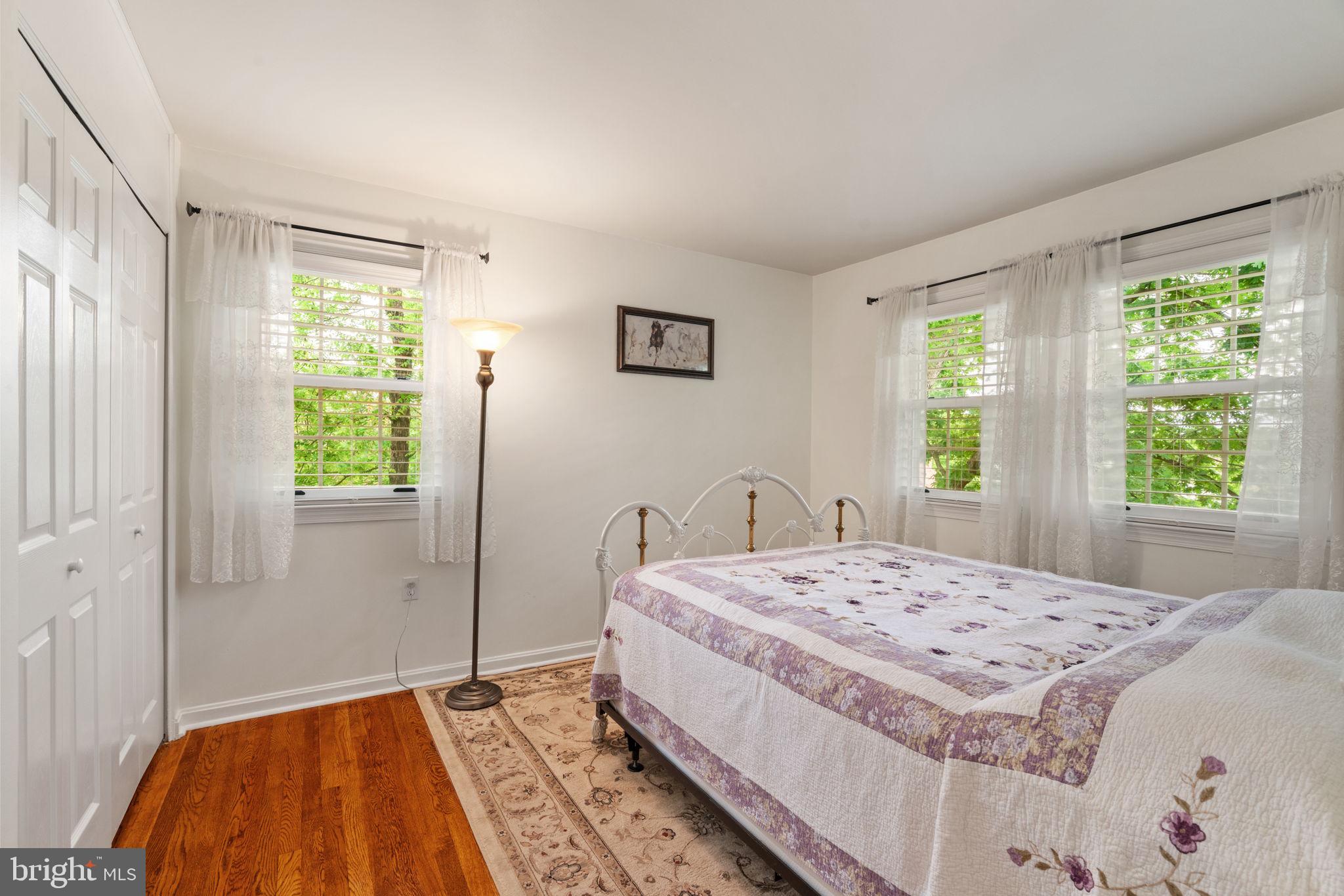 7610 Bland Drive Manassas, VA 20109 - Photo 13 of 43 a bedroom with a bed and a window