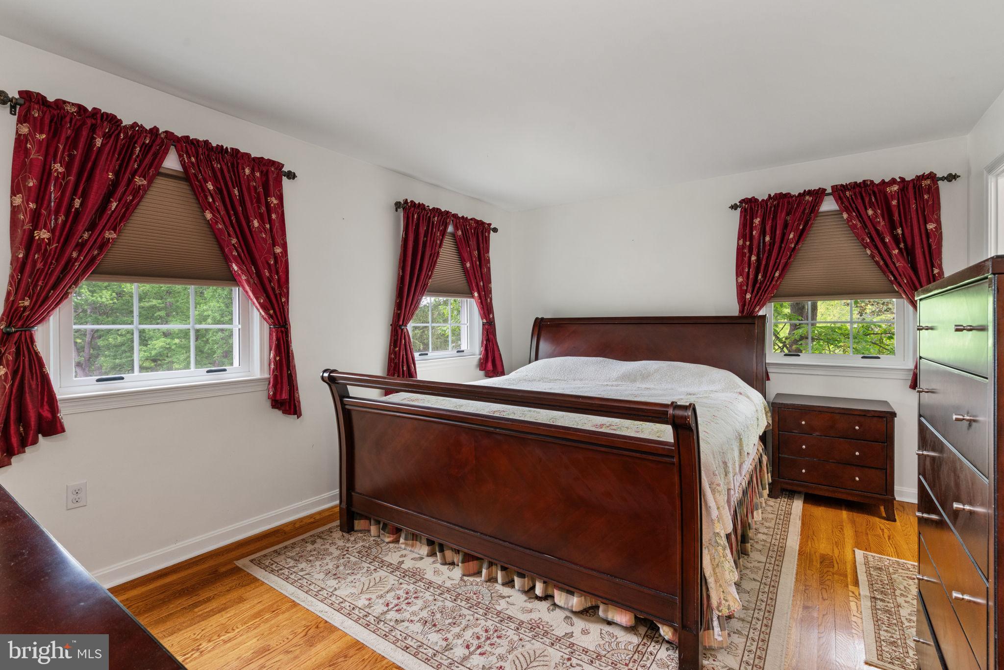 7610 Bland Drive Manassas, VA 20109 - Photo 19 of 43 a bedroom with a bed and a window