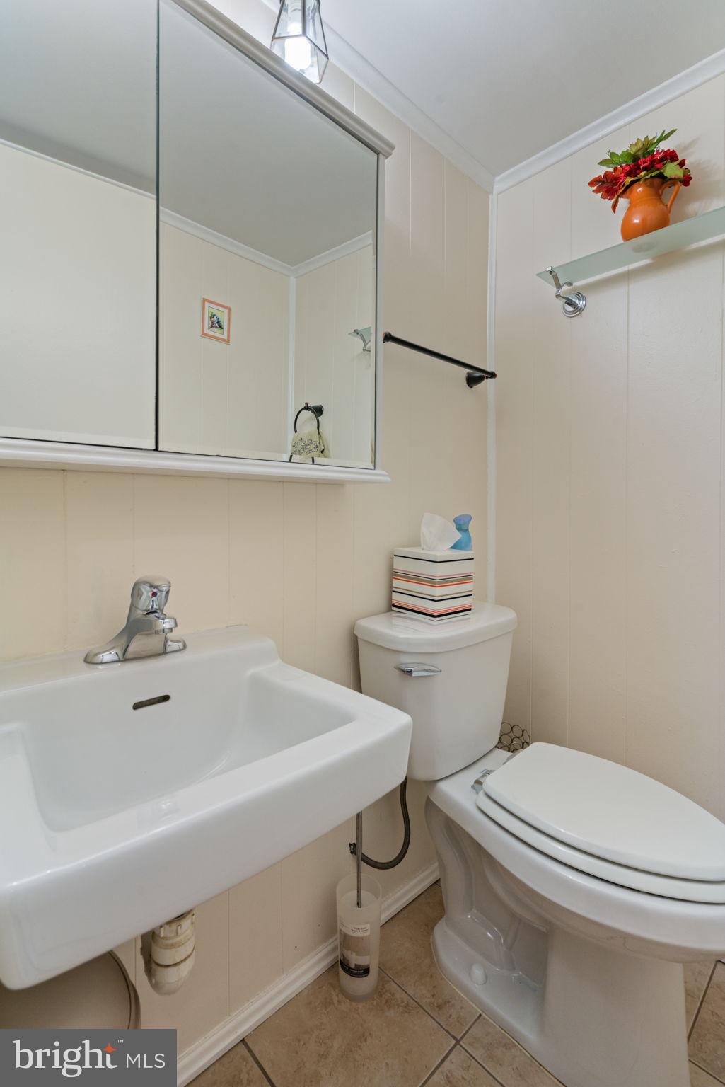 7610 Bland Drive Manassas, VA 20109 - Photo 32 of 43 a bathroom with a sink a toilet and bathtub