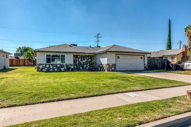 a view of a house with a swimming pool