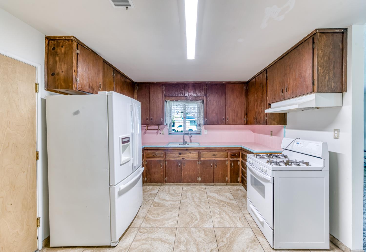 8625 La Vaca Way Hanford, CA 93230 - Photo 13 of 33 a kitchen with stainless steel appliances granite countertop a refrigerator sink and stove