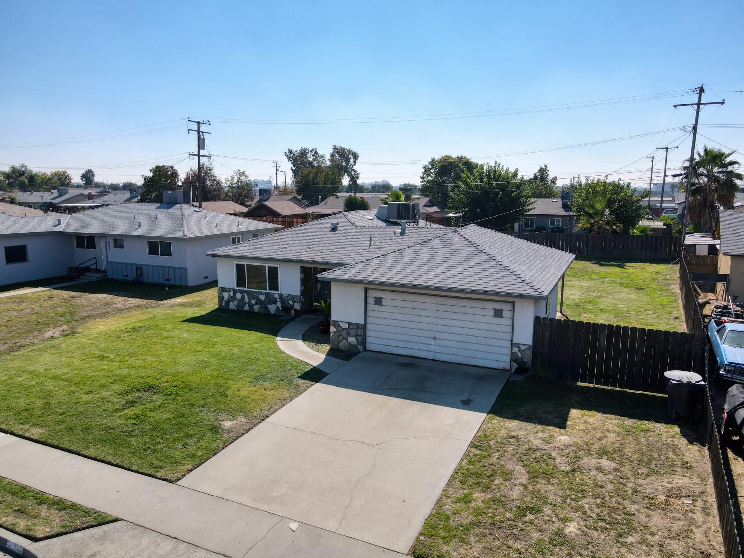 8625 La Vaca Way Hanford, CA 93230 - Photo 29 of 33 a view of a house with a backyard