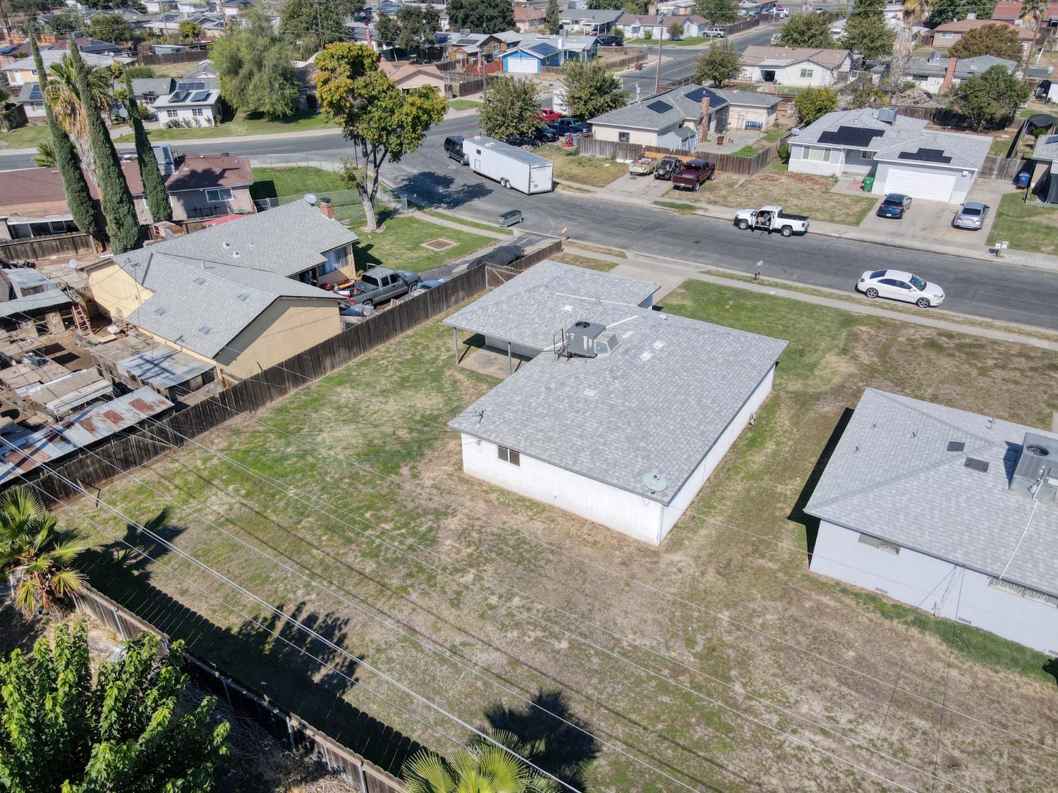 8625 La Vaca Way Hanford, CA 93230 - Photo 31 of 33 an aerial view of residential houses with outdoor space