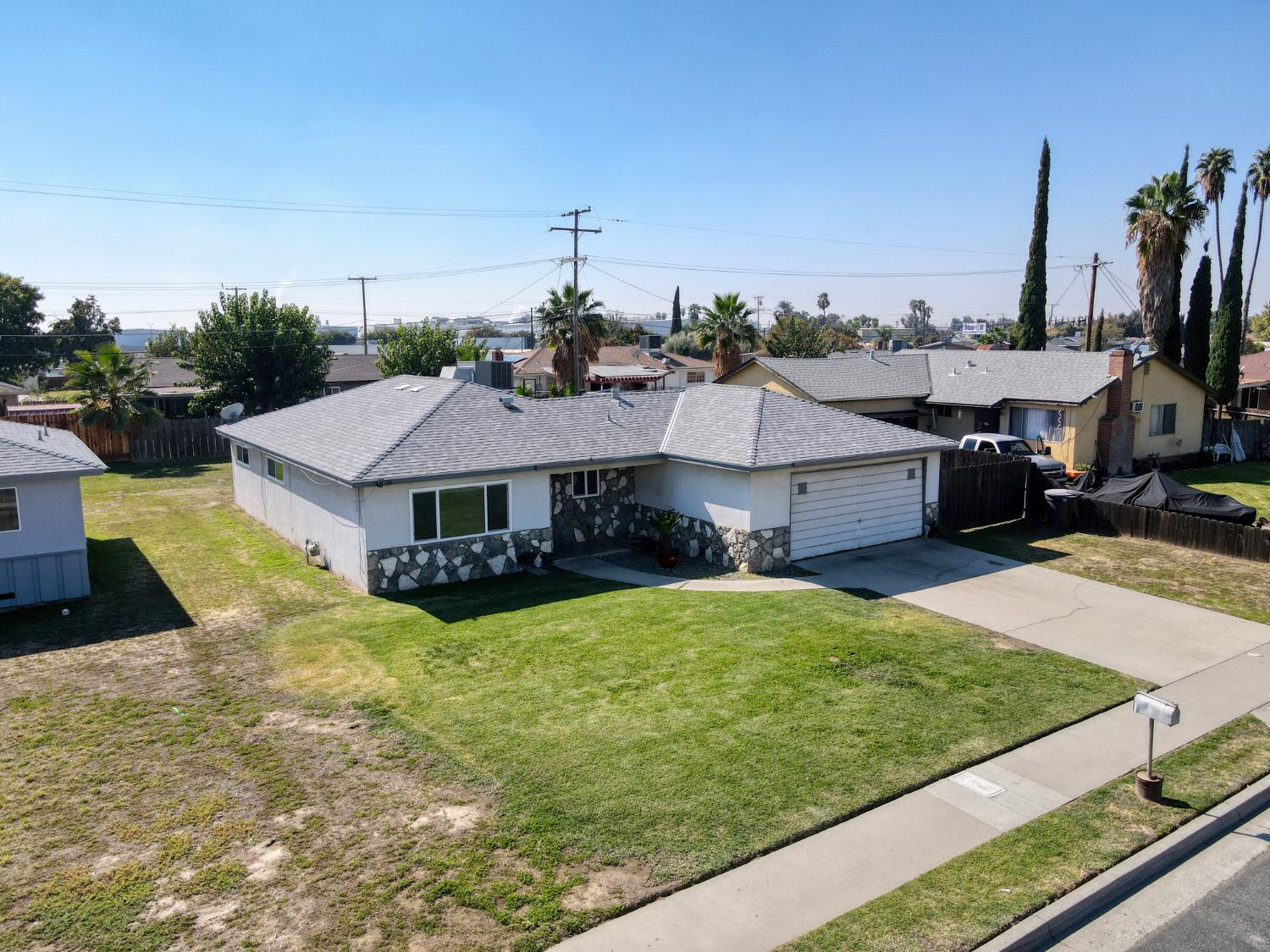 8625 La Vaca Way Hanford, CA 93230 - Photo 33 of 33 a view of a house with pool and sitting area