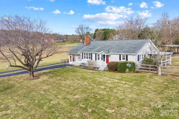 a house view with a garden space