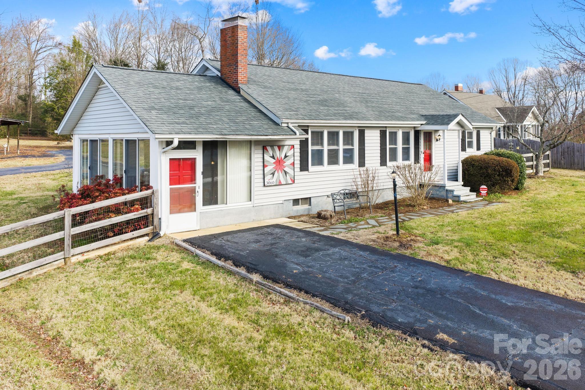 3060 Poplar Springs Road State Road, NC 28676 - Photo 12 of 38 a house with swimming pool in front of it