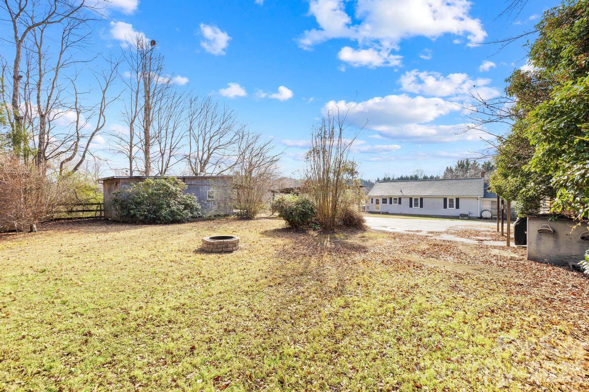 3060 Poplar Springs Road State Road, NC 28676 - Photo 22 of 38 a view of a street with a building in the background