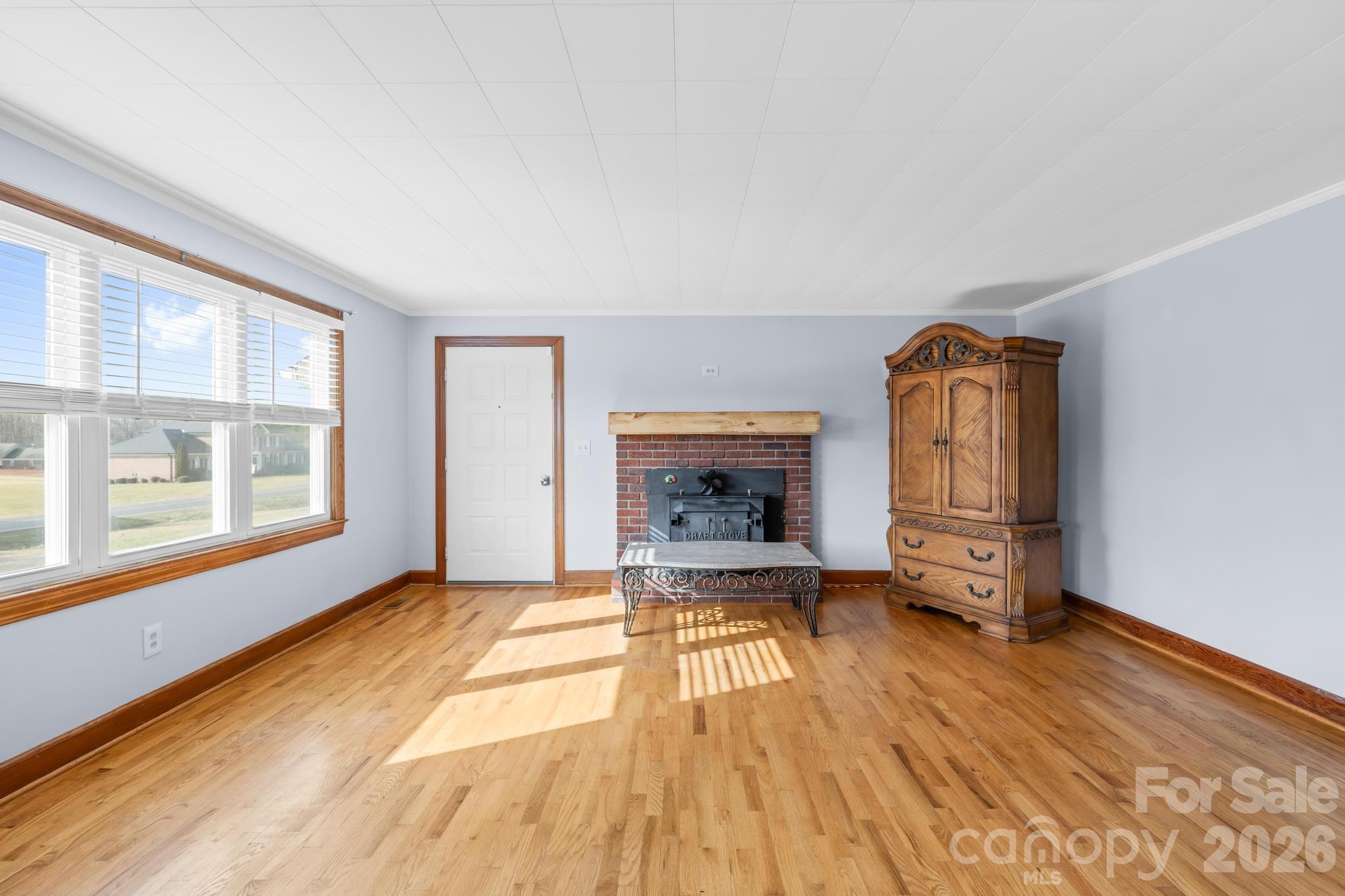 3060 Poplar Springs Road State Road, NC 28676 - Photo 24 of 38 a view of livingroom with furniture and fireplace