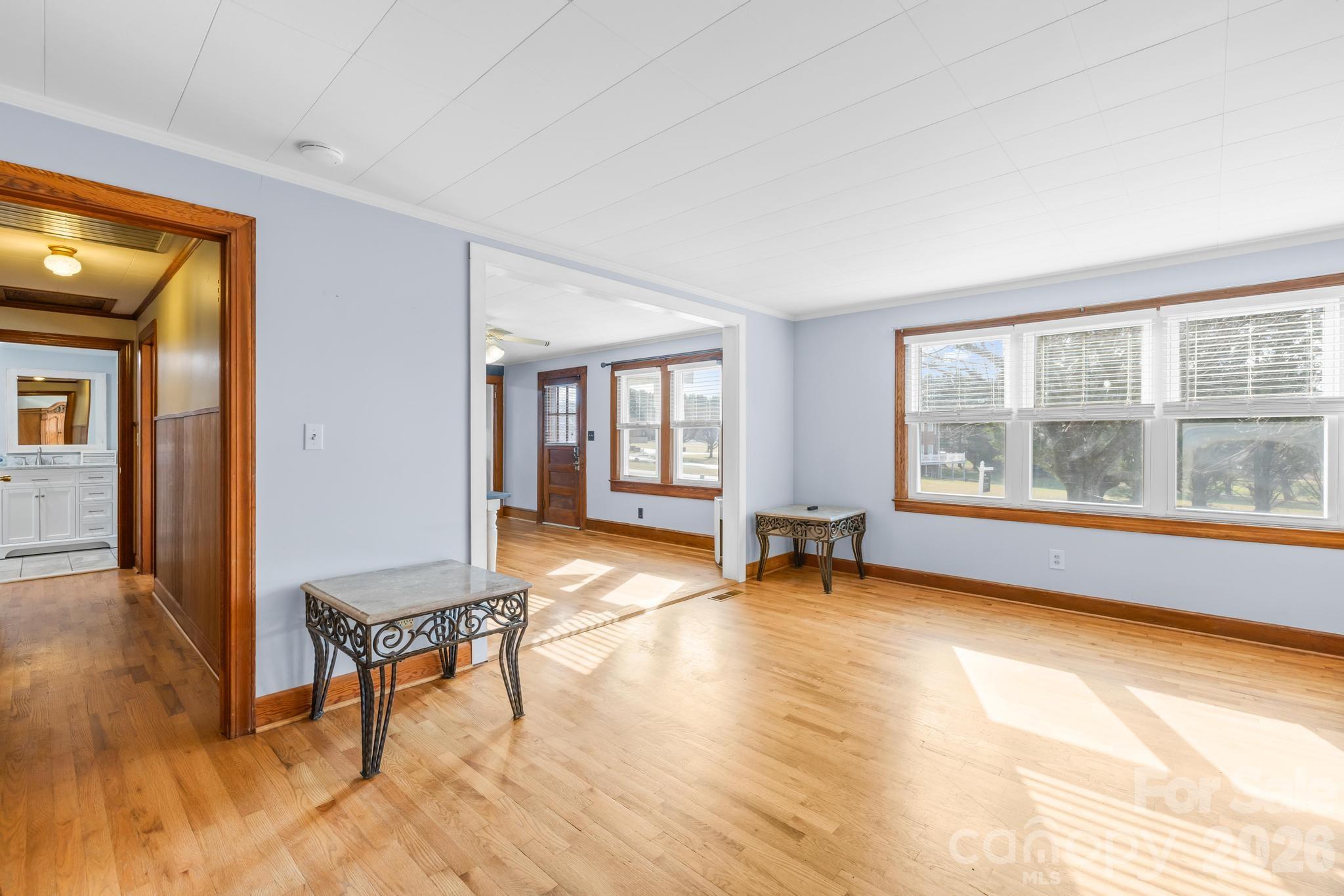 3060 Poplar Springs Road State Road, NC 28676 - Photo 25 of 38 a view of an empty room with glass door and furniture