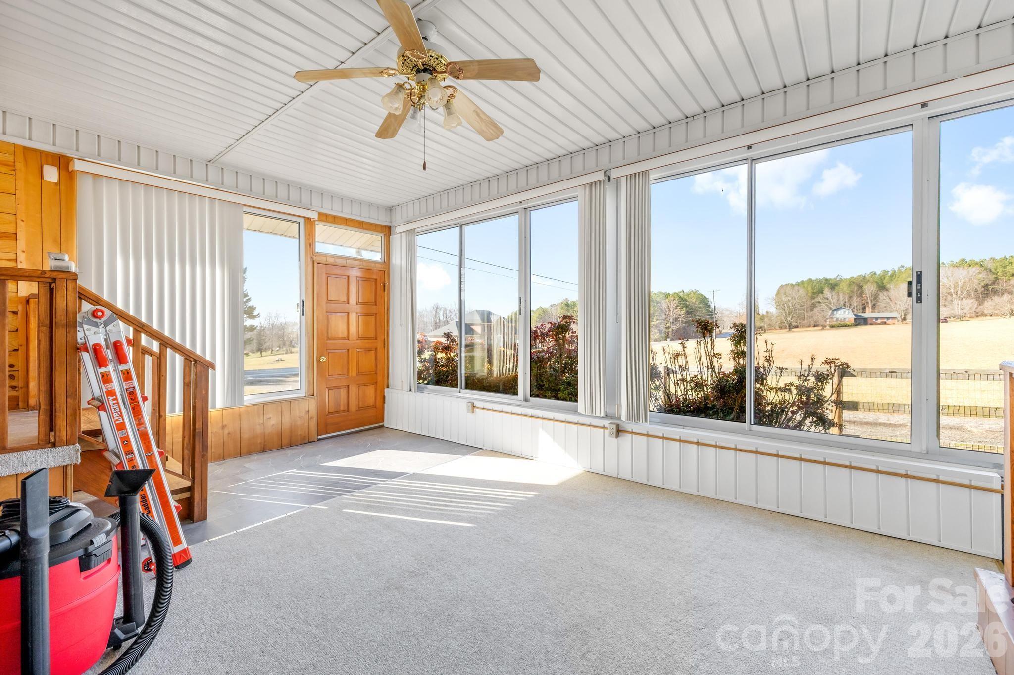 3060 Poplar Springs Road State Road, NC 28676 - Photo 36 of 38 a view of an empty room with a window