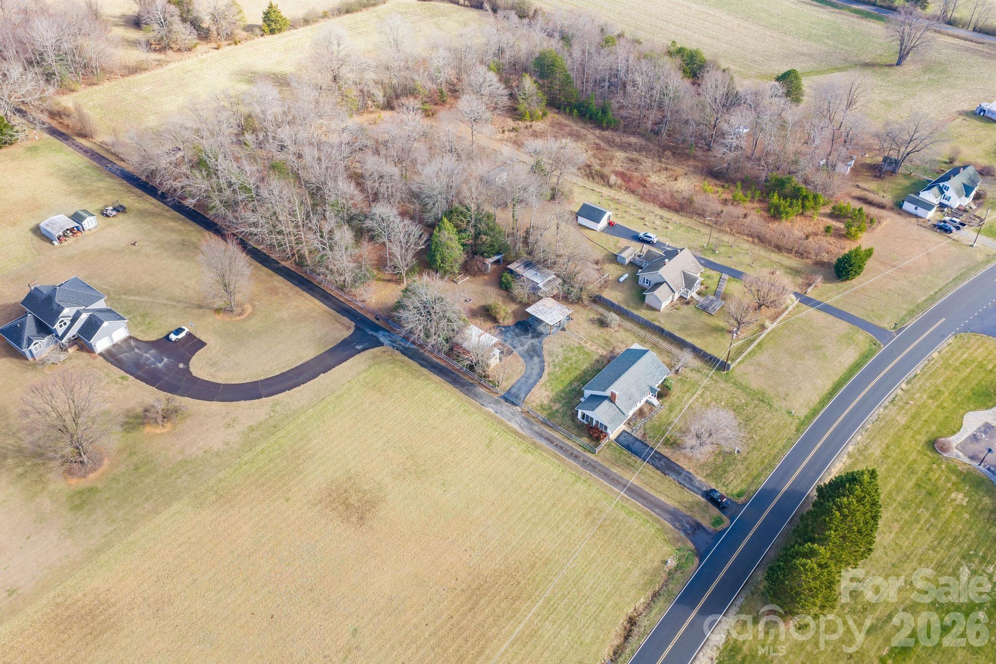 3060 Poplar Springs Road State Road, NC 28676 - Photo 5 of 38 a view of a swimming pool with an outdoor space