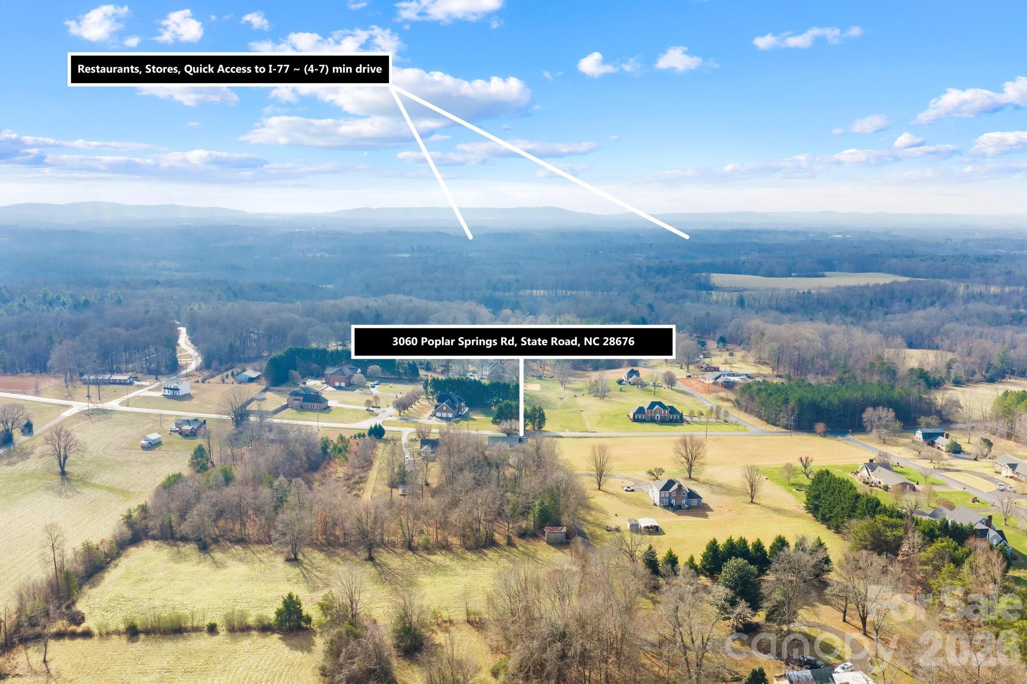 3060 Poplar Springs Road State Road, NC 28676 - Photo 9 of 38 a view of a swimming pool with an outdoor space