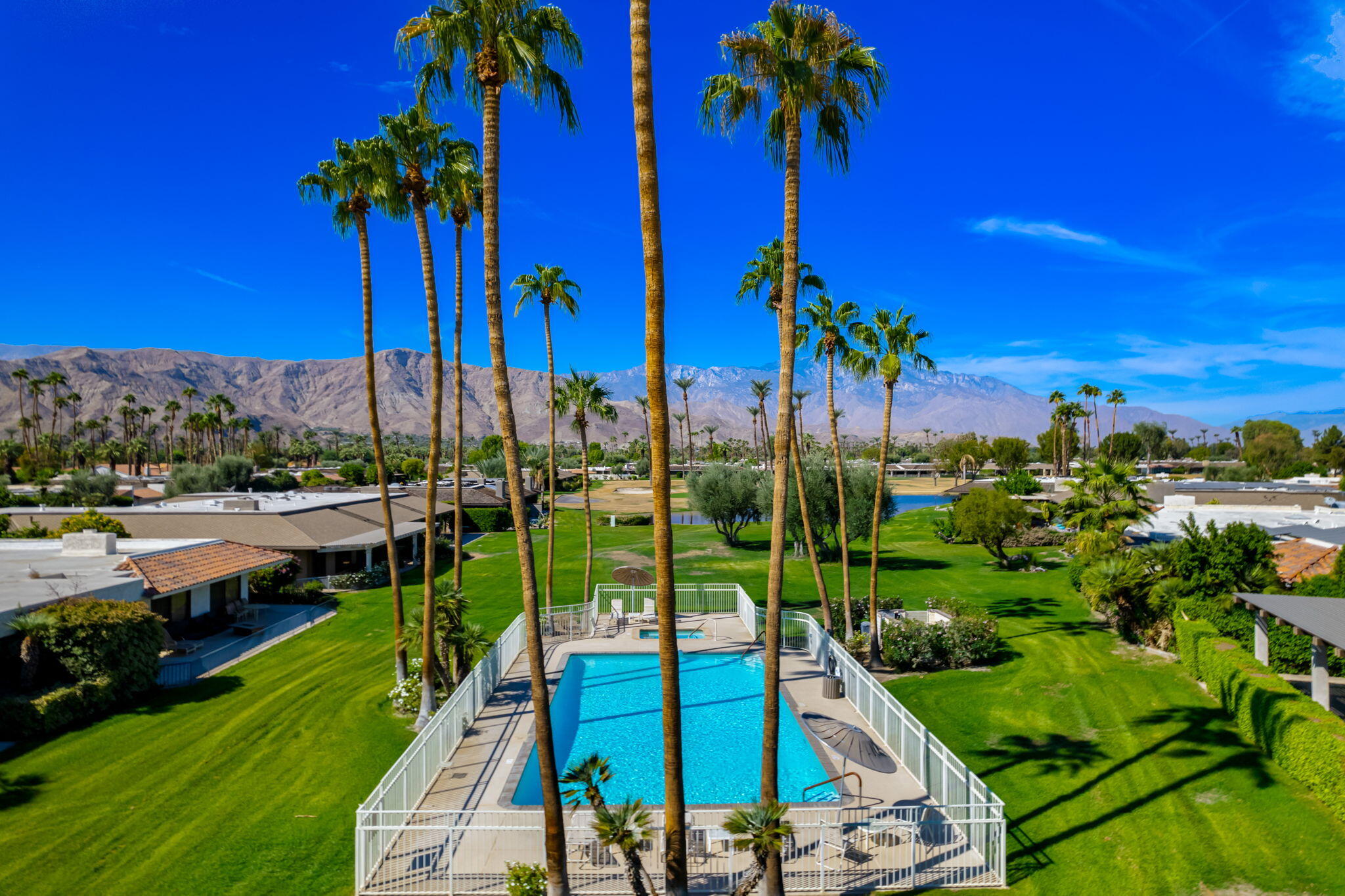 14 Reed Court Rancho Mirage, CA 92270 - Photo 28 of 36 Community Pool w/ Mountain Views