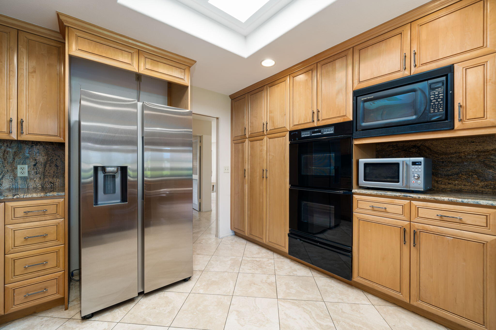 14 Reed Court Rancho Mirage, CA 92270 - Photo 10 of 36 Kitchen View from Family Room