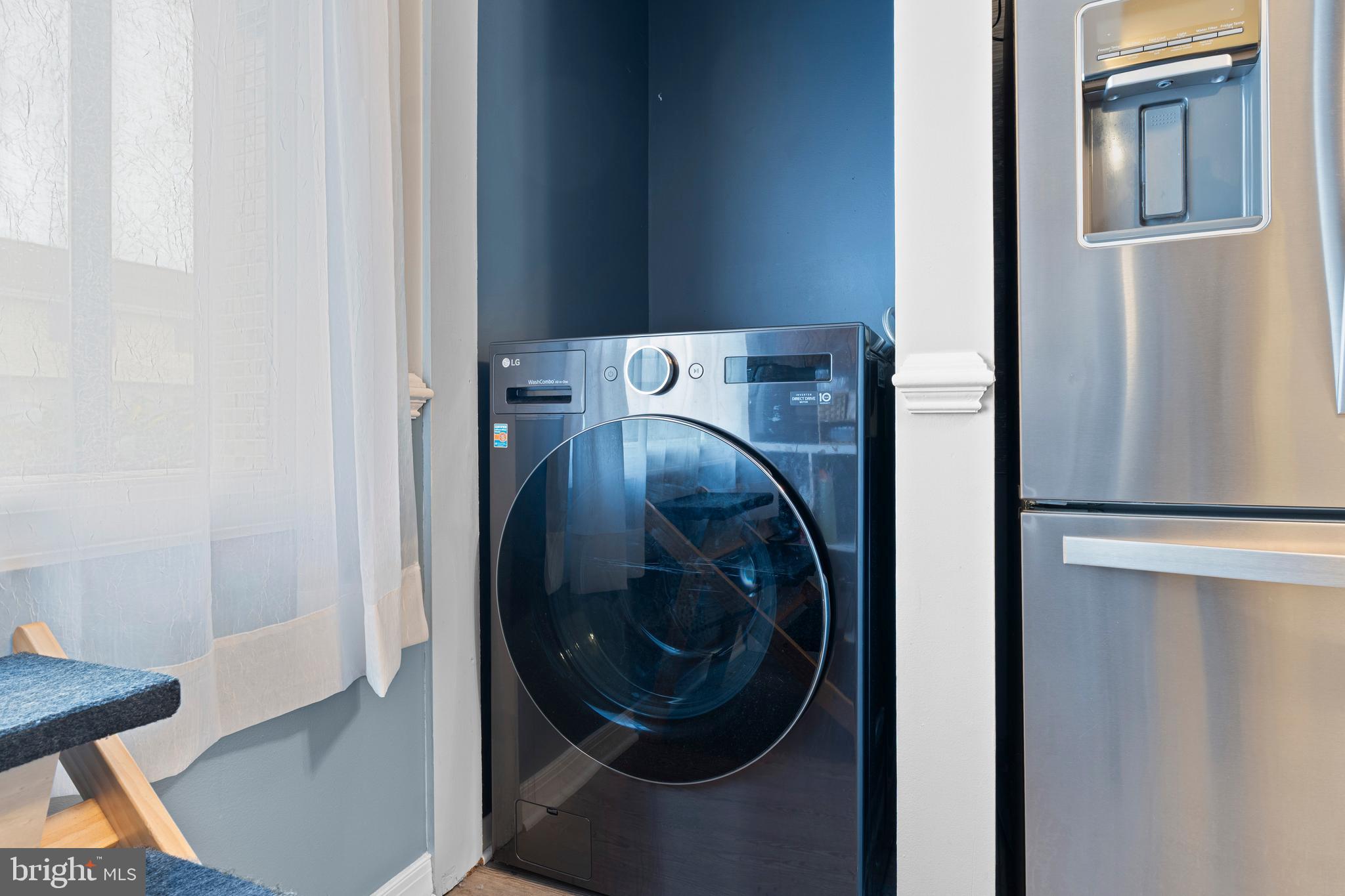 9815 Stephen Decatur Highway, Unit 14 Ocean City, MD 21842 - Photo 11 of 30 a utility room with dryer and washer