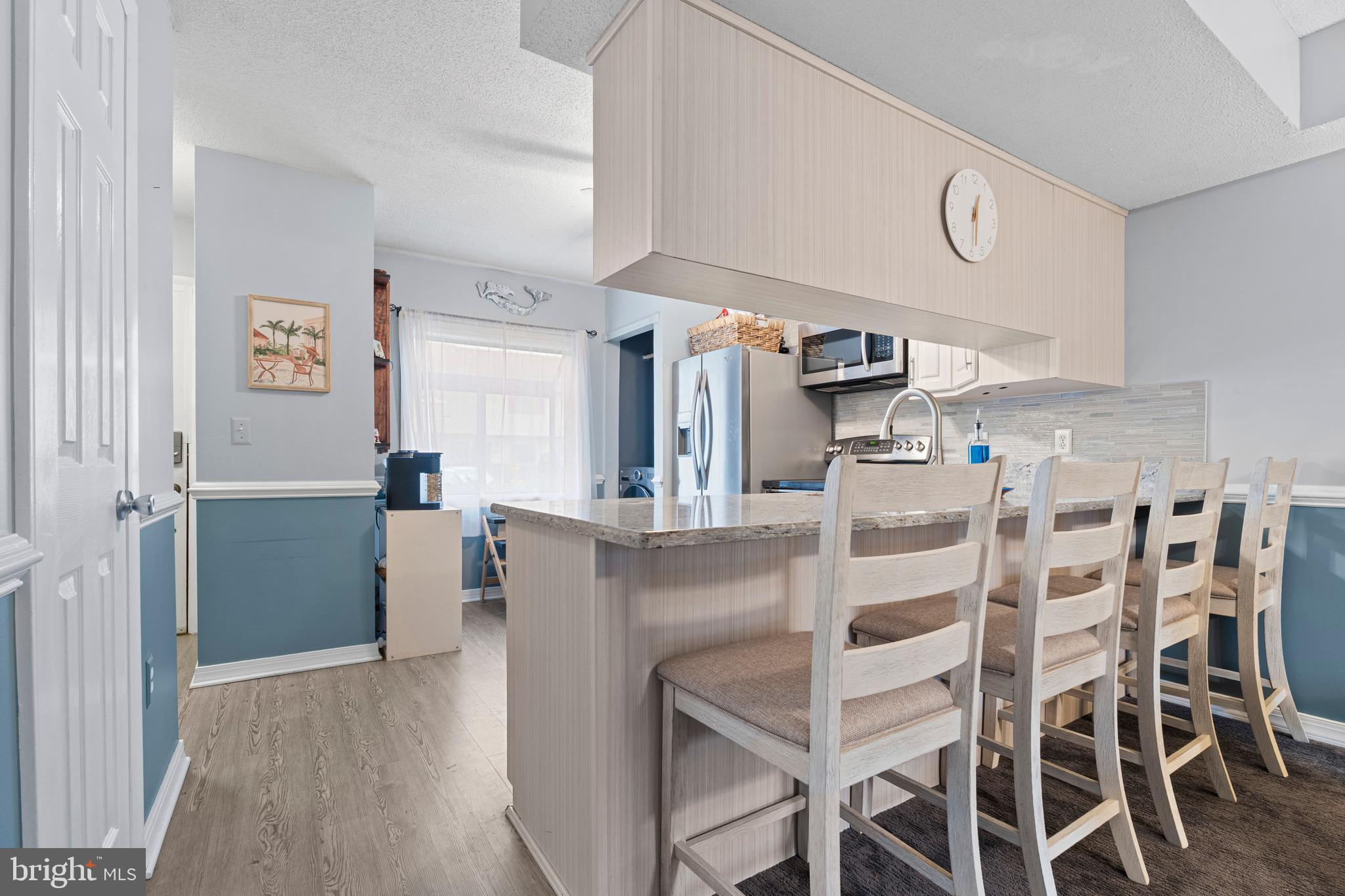 9815 Stephen Decatur Highway, Unit 14 Ocean City, MD 21842 - Photo 12 of 30 a dining room with furniture and window