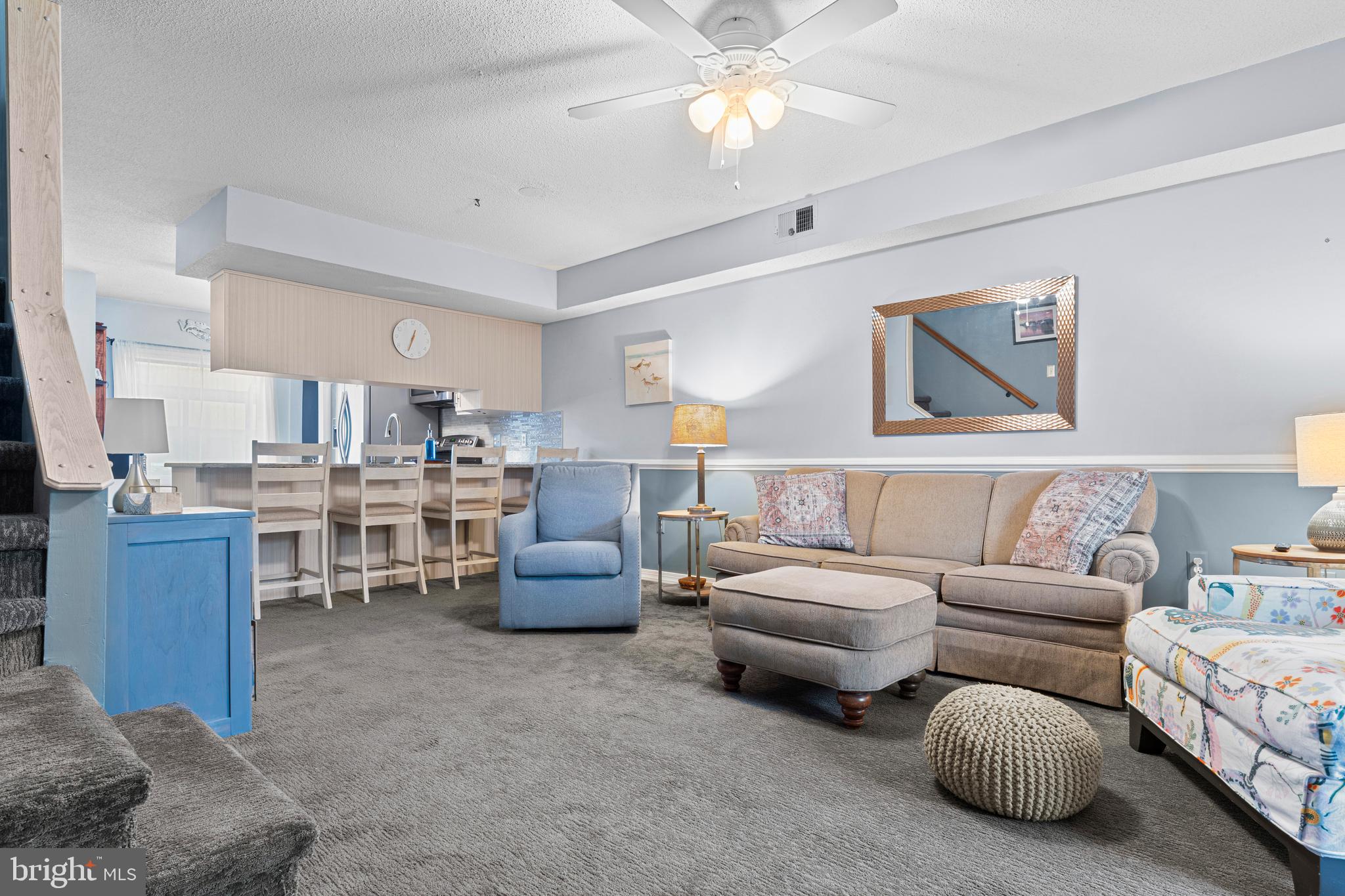 9815 Stephen Decatur Highway, Unit 14 Ocean City, MD 21842 - Photo 13 of 30 a living room with furniture and kitchen view