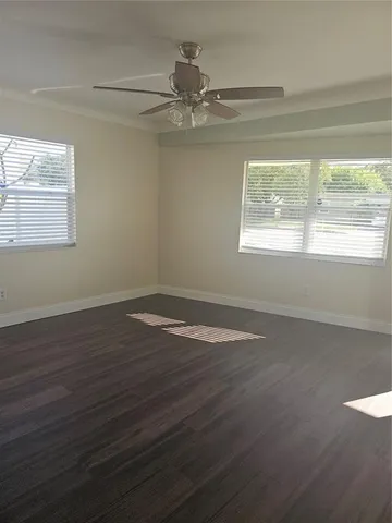 an empty room that has a window