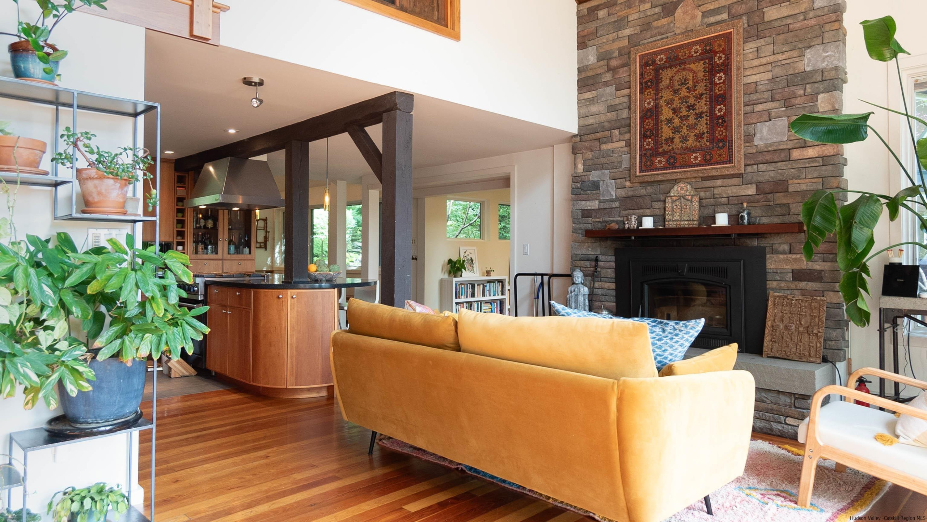 310 Jims Road Mount Tremper, NY 12457 - Photo 13 of 35 a living room with furniture and a fireplace