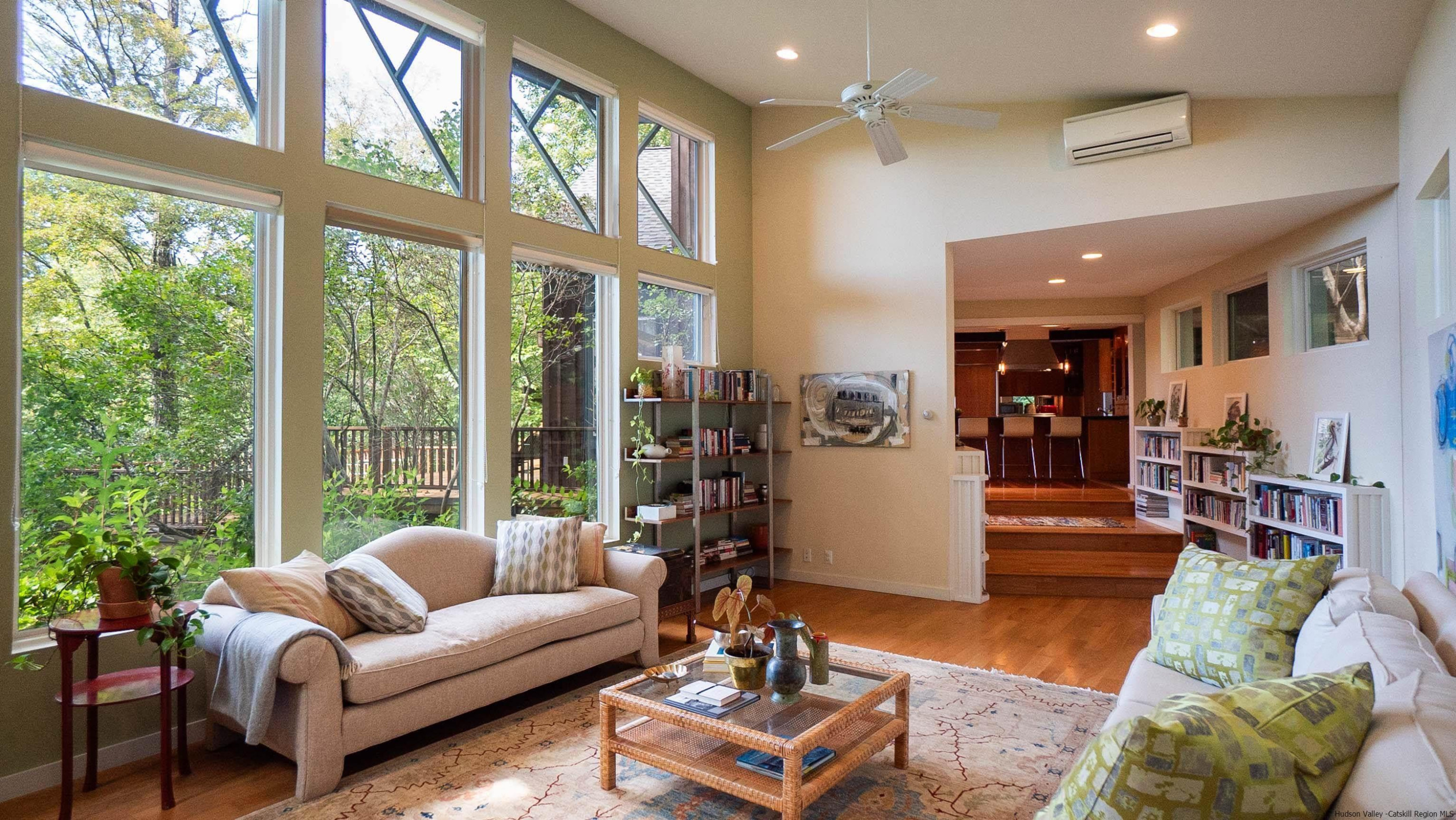 310 Jims Road Mount Tremper, NY 12457 - Photo 17 of 35 a living room with furniture and a large window