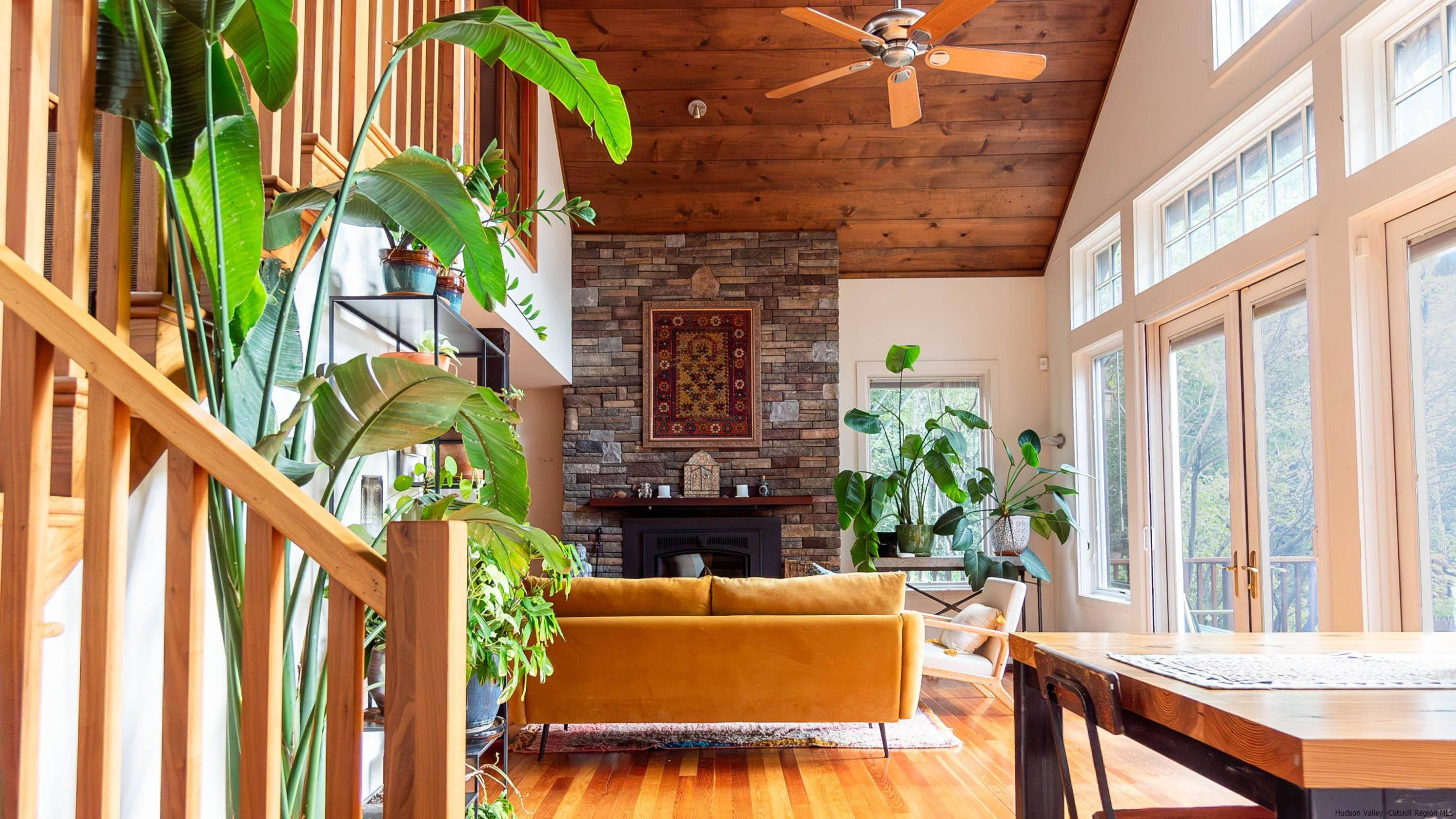 310 Jims Road Mount Tremper, NY 12457 - Photo 19 of 35 a living room with patio furniture and a potted plant