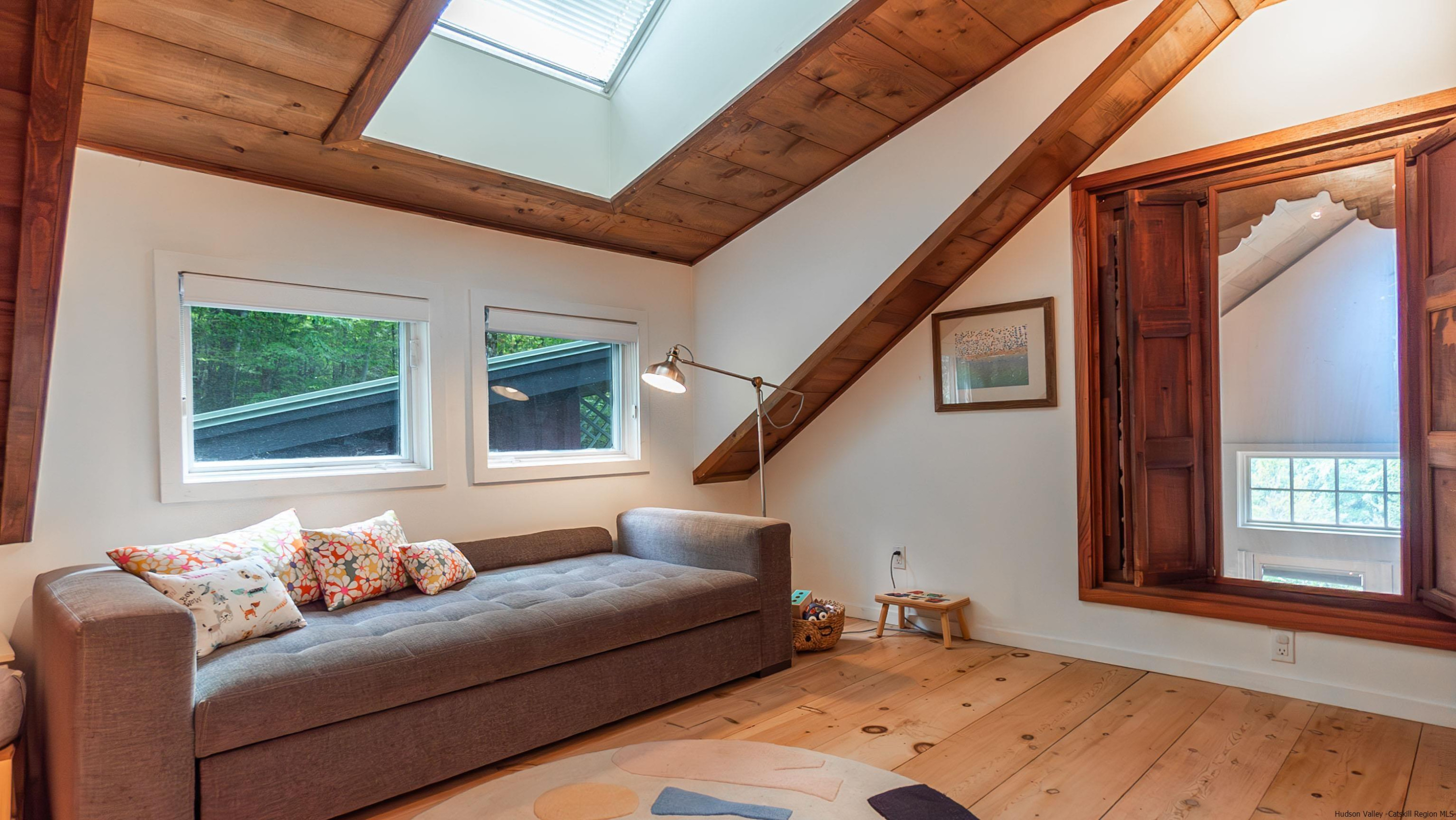 310 Jims Road Mount Tremper, NY 12457 - Photo 23 of 35 a living room with furniture and windows