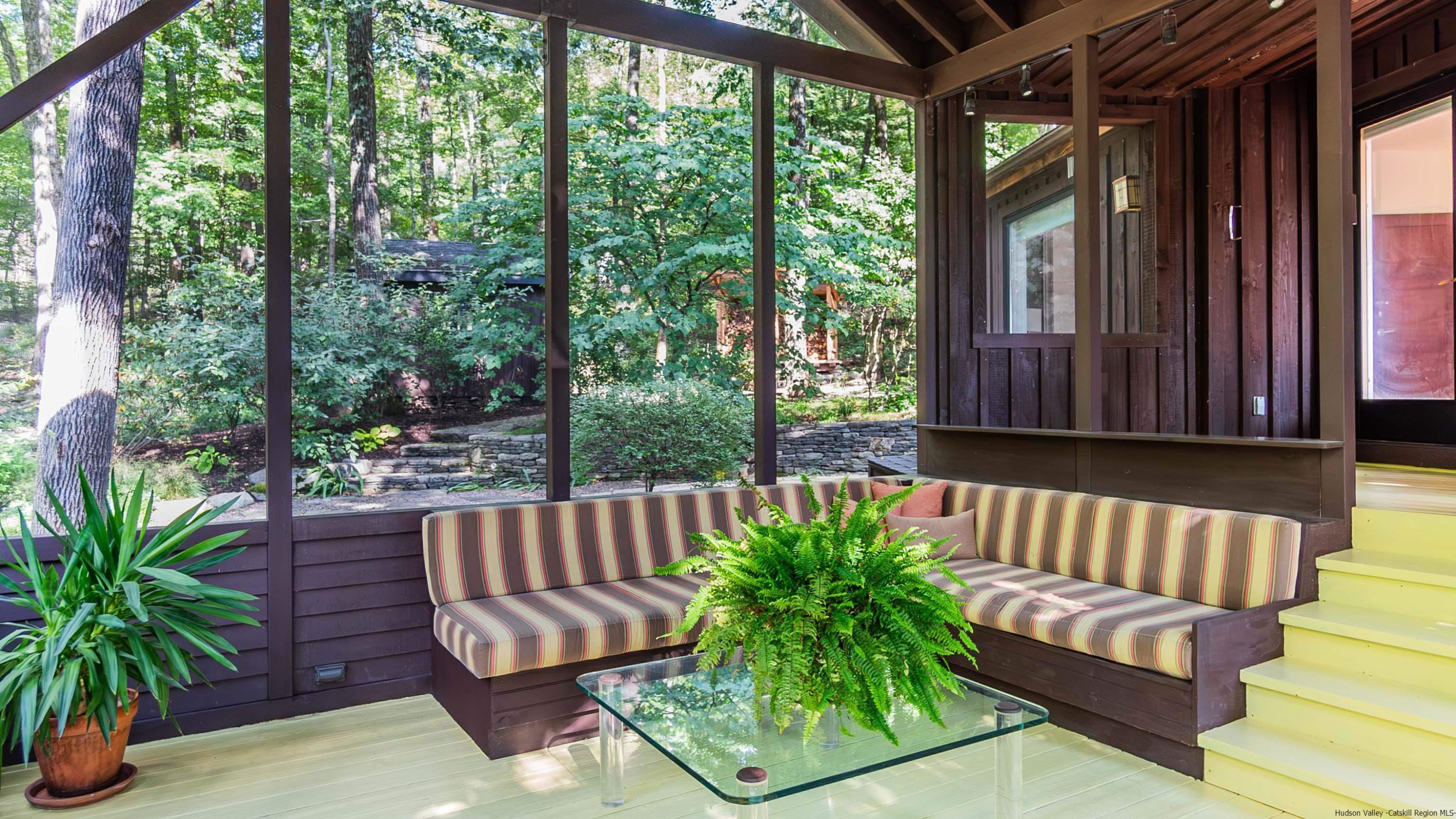 310 Jims Road Mount Tremper, NY 12457 - Photo 26 of 35 a view of a chair in the deck