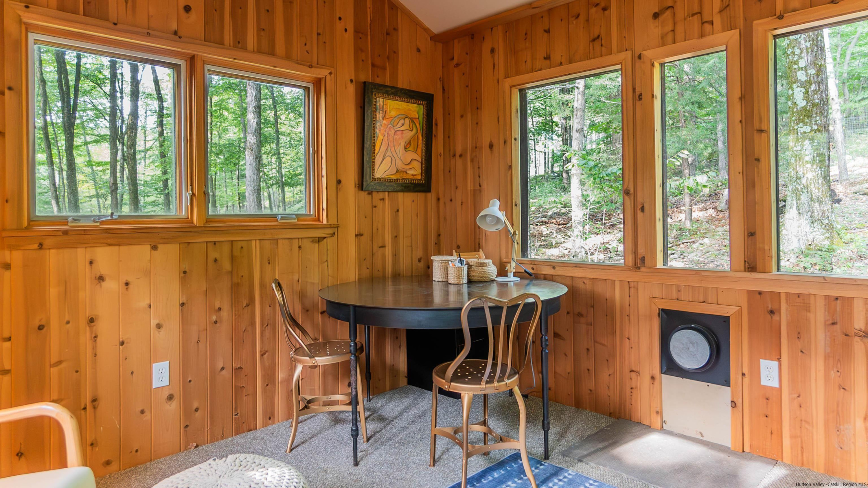 310 Jims Road Mount Tremper, NY 12457 - Photo 34 of 35 a dining room with furniture and large windows