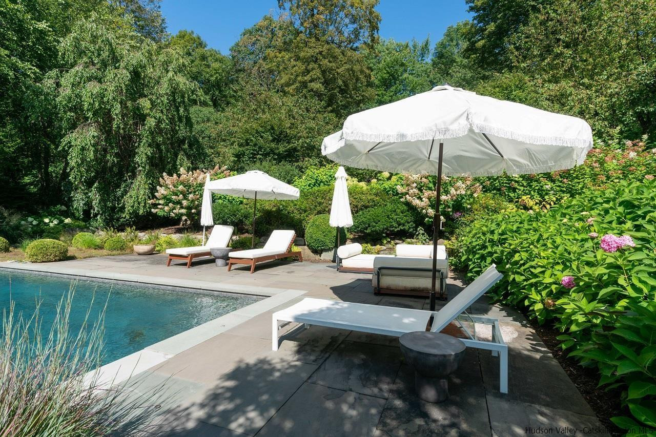 310 Jims Road Mount Tremper, NY 12457 - Photo 7 of 35 a view of a swimming pool with a patio