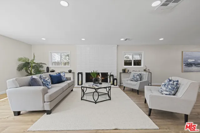 a living room with furniture and a couch