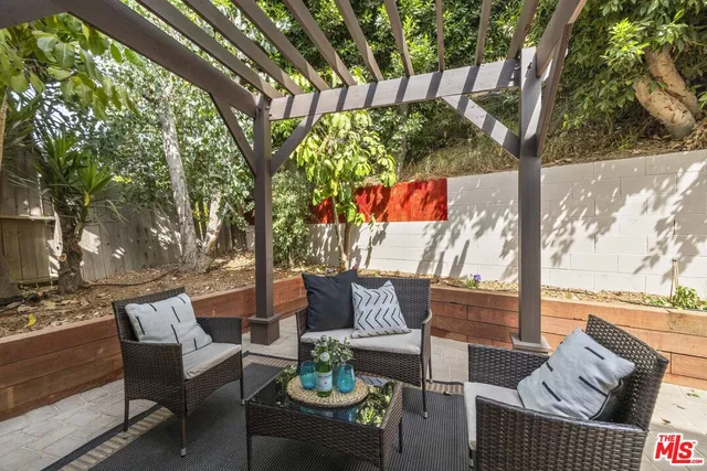 a view of a backyard with a patio