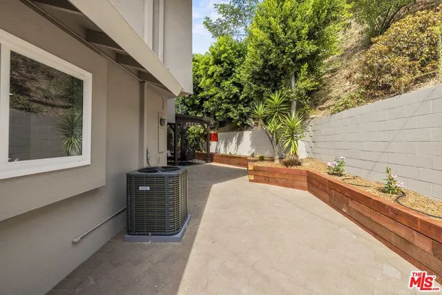 a view of a house with a patio