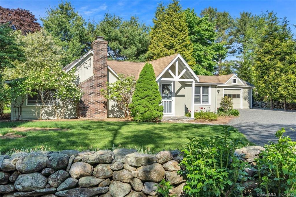 33 Smiths Neck Road Old Lyme, CT 06371 - Photo 1 of 1 a front view of a house with a garden