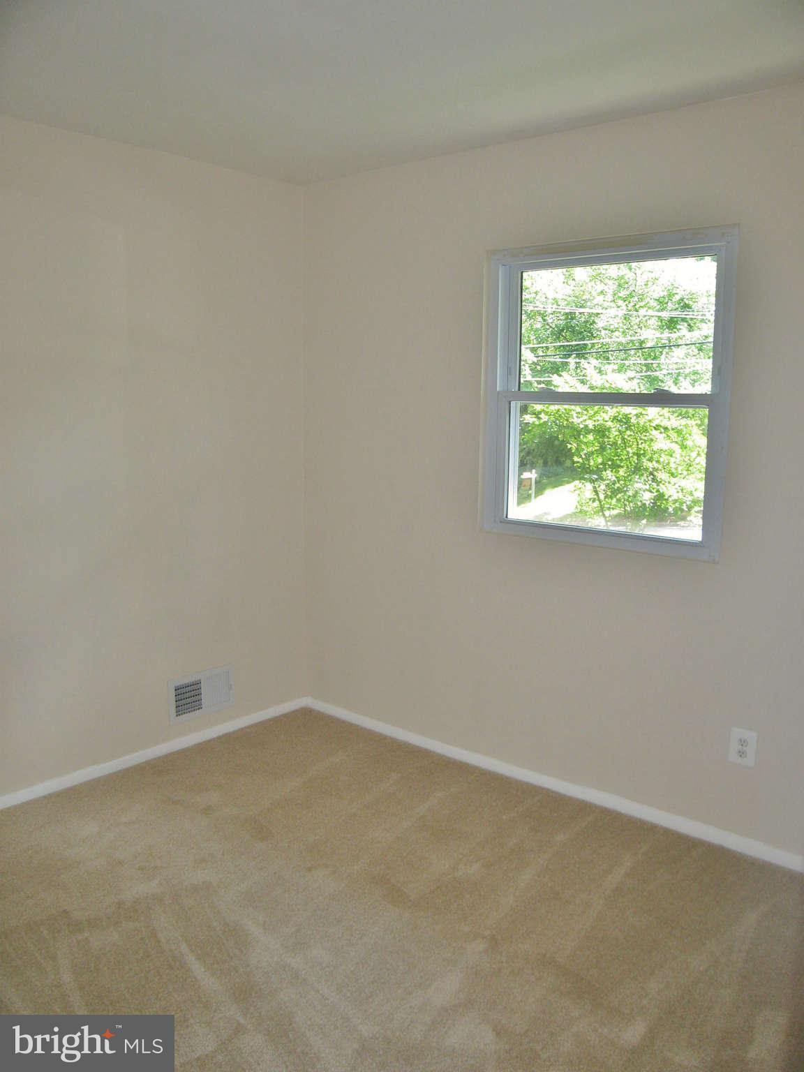 8113 Karl Road Alexandria, VA 22308 - Photo 11 of 15 an empty room with a window
