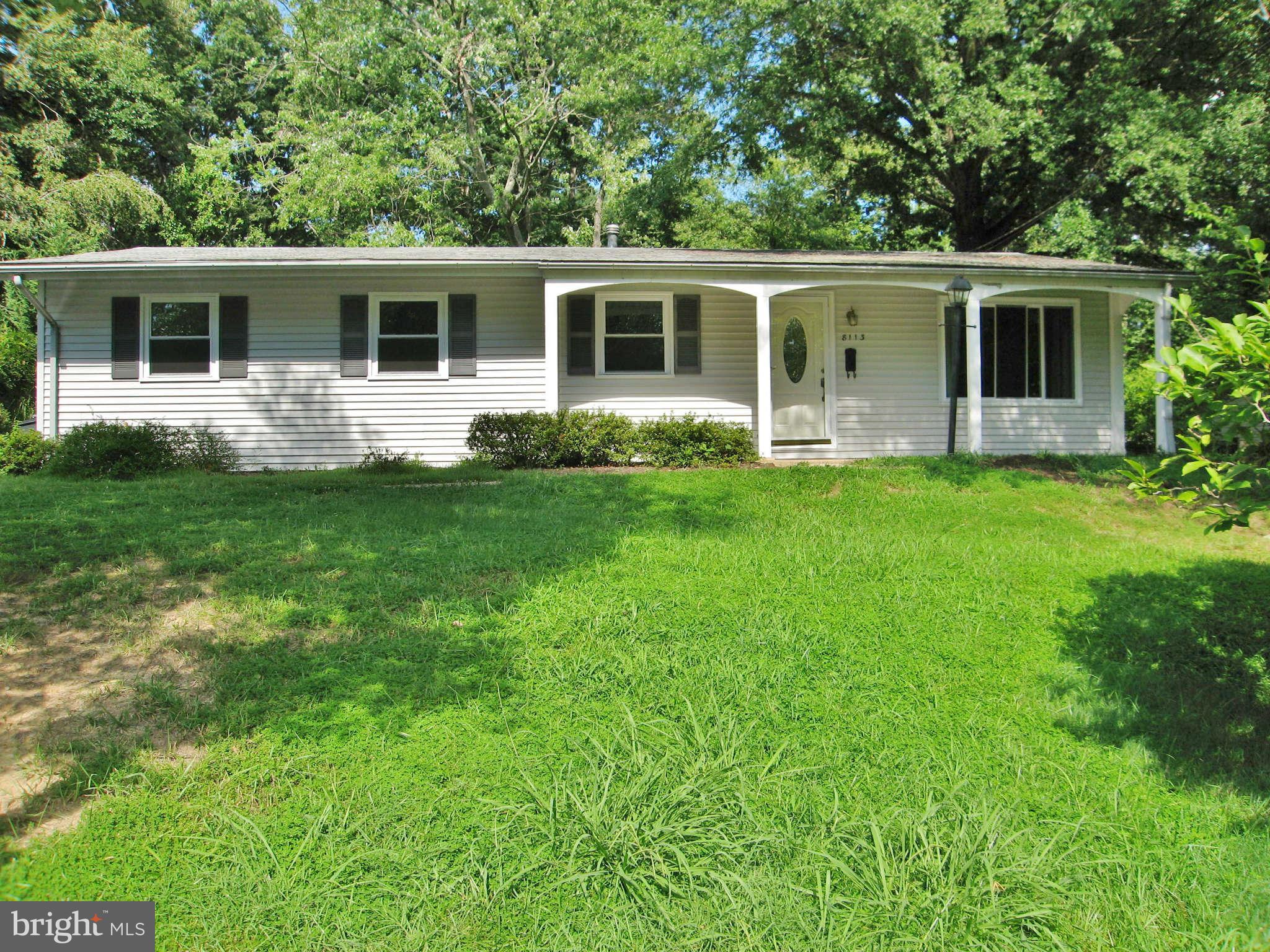 8113 Karl Road Alexandria, VA 22308 - Photo 15 of 15 a front view of house with yard and green space