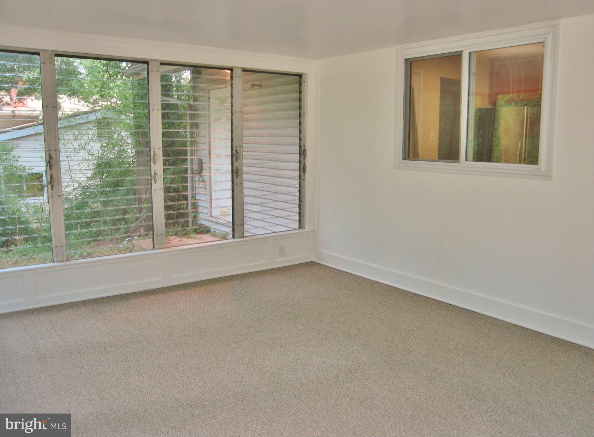 8113 Karl Road Alexandria, VA 22308 - Photo 7 of 15 an empty room with a window