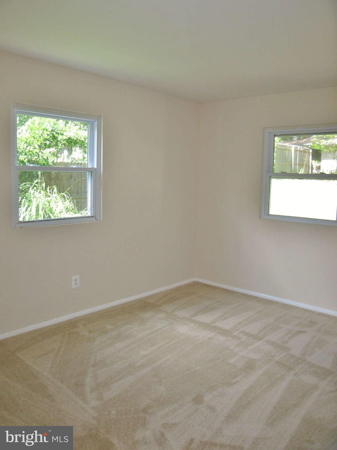 8113 Karl Road Alexandria, VA 22308 - Photo 8 of 15 an empty room with a window