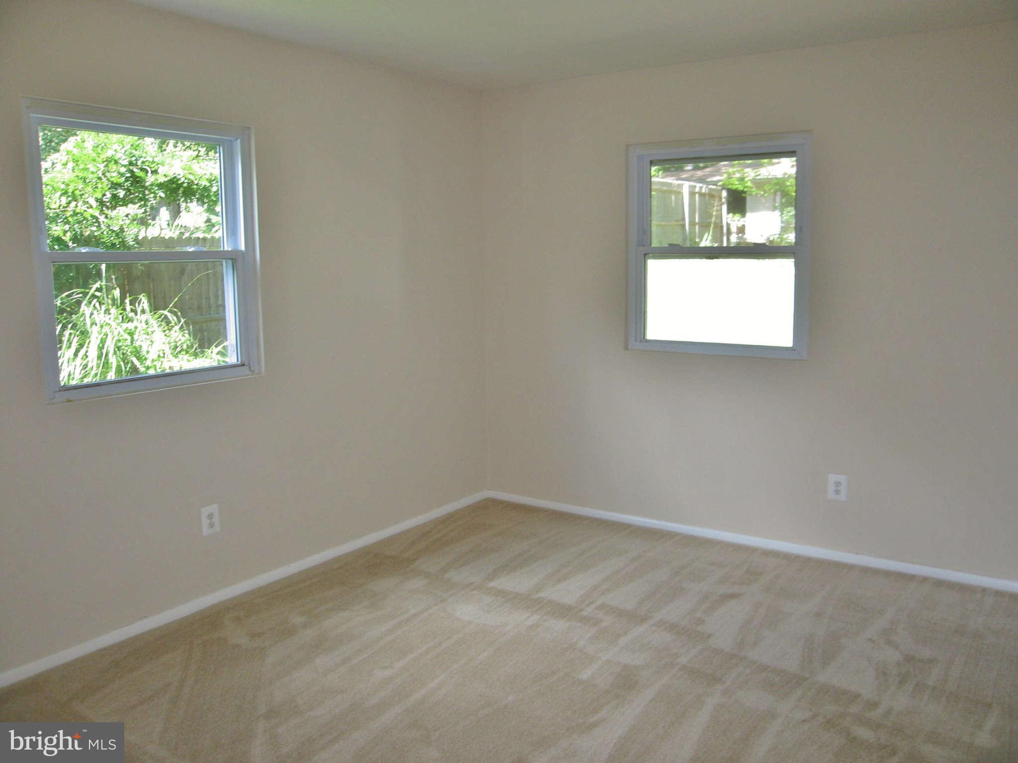 8113 Karl Road Alexandria, VA 22308 - Photo 9 of 15 an empty room with a window