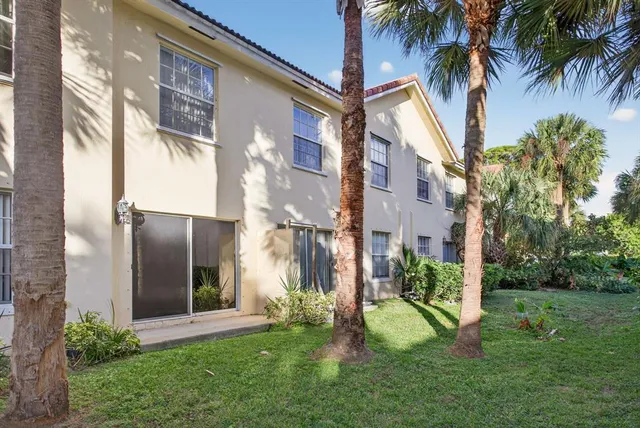a view of a yard in front of a building