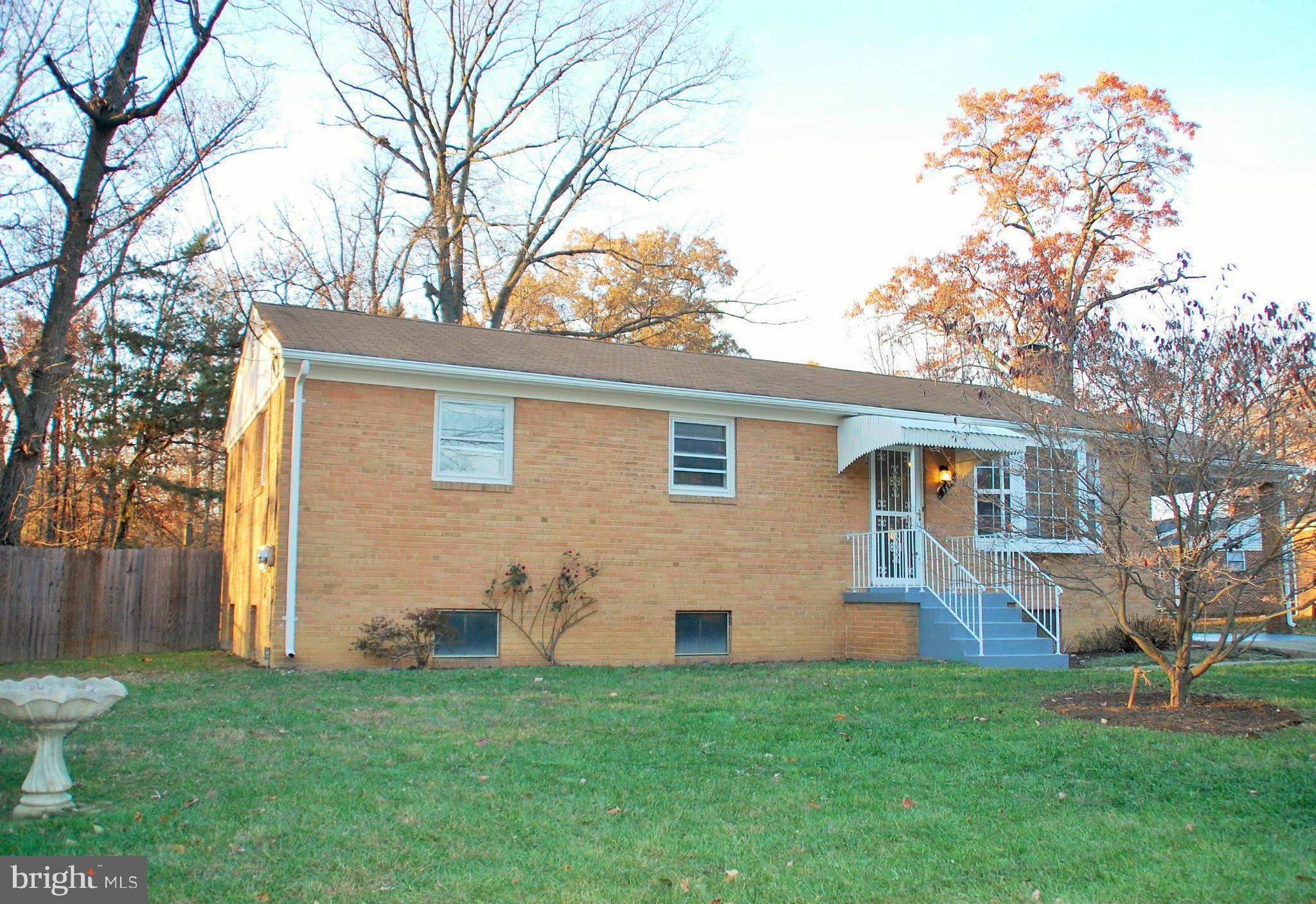 5508 Spruce Drive Clinton, MD 20735 - Photo 2 of 18 a view of a house with a backyard